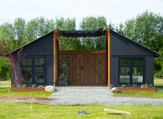 Outdoor garden event space surrounded by flowers with Mt. Rainier in the background. Great for hosting an event near Seattle, bridal showers, baby showers, elopements, micro weddings.